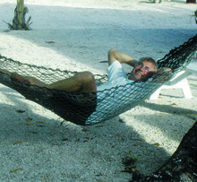 Jim Petersen ’71 takes a break during a dive trip in Bikini Atoll. PHOTO: Courtesy of Jim Petersen ’71
